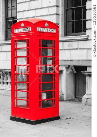 Traditional old style red telephone box in London 123510561