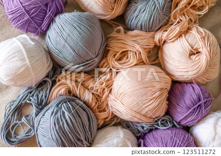Vibrant wool yarn balls in a close-up shot Vibrant wool yarn balls in a close-up shot 123511272
