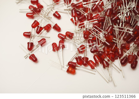 Red LED bulbs on a white background. The radio element is an LED lamp. 123511366