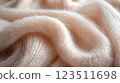 Creamy Knit Wool Fabric with Soft Folds 123511698