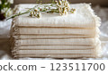 Stack of Cream Gauze Fabrics with Flowers 123511700