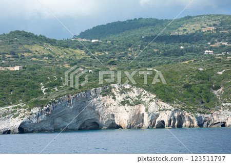 Landscape. Cave with a coastal cliff shoreline. Landscape. Cave with a coastal cliff shoreline. 123511797