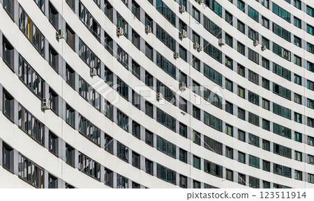 Modern architecture and building design in a developing urban neighborhood. Multi-story high-rise 123511914