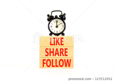 Like share follow symbol. Concept words Like Share Follow on beautiful wooden blocks. Beautiful white background. Black alarm clock. Business like share follow concept. Copy space. Like share follow symbol. Concept words Like Share Follow on beautiful wooden blocks. Beautiful white background. Black alarm clock. Business like share follow concept. Copy space. 123512052