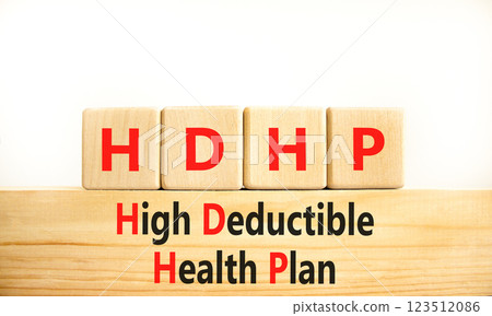 HDHP High Deductible Health Plan symbol. Concept word HDHP High Deductible Health Plan on beautiful blocks. Beautiful white background. Business HDHP High Deductible Health Plan concept. Copy space. 123512086