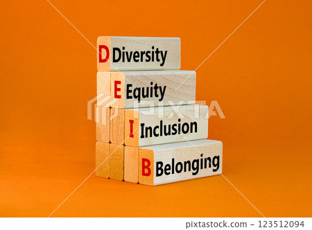DEIB diversity equity inclusion belonging symbol. Concept words DEIB diversity equity inclusion belonging on blocks. Beautiful orange background. Business diversity equity inclusion belonging concept. DEIB diversity equity inclusion belonging symbol. Concept words DEIB diversity equity inclusion belonging on blocks. Beautiful orange background. Business diversity equity inclusion belonging concept. 123512094