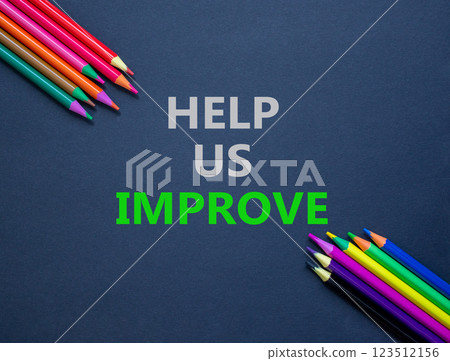 Help us improve symbol. Concept words Help us improve on beautiful grey paper. Beautiful grey paper background. Colored pencils. Business motivational help us improve concept. Copy space. Help us improve symbol. Concept words Help us improve on beautiful grey paper. Beautiful grey paper background. Colored pencils. Business motivational help us improve concept. Copy space. 123512156