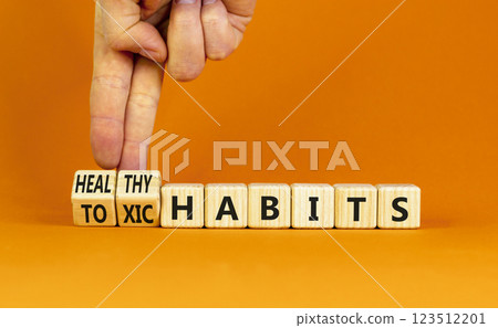 Healthy or toxic habits symbol. Concept words Healthy habits or Toxic habits on beautiful wooden blocks. Beautiful orange table orange background. Business healthy or toxic habits concept. Copy space. Healthy or toxic habits symbol. Concept words Healthy habits or Toxic habits on beautiful wooden blocks. Beautiful orange table orange background. Business healthy or toxic habits concept. Copy space. 123512201