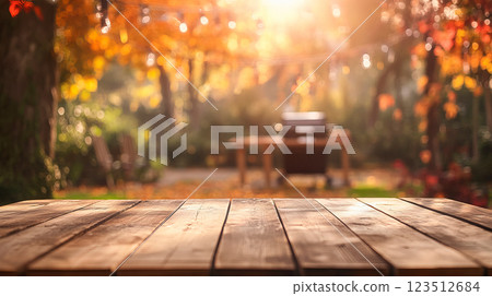 Autumn party in backyard garden with grill and wooden table 123512684