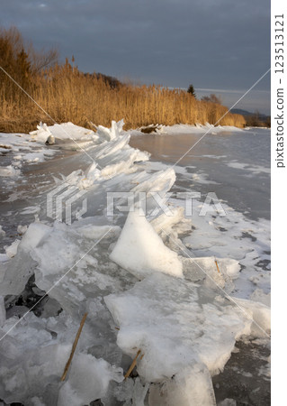 Frozen Lipno and ice on the coast, Czechia Frozen Lipno and ice on the coast, Czechia 123513121