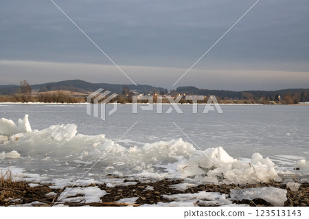 Frozen Lipno and ice on the coast, Czechia Frozen Lipno and ice on the coast, Czechia 123513143