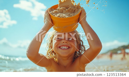 Happy child playing with sand pail on beach summer vacation Happy child playing with sand pail on beach summer vacation 123513364