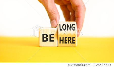 Belonging and belong symbol. Concept words Be here Belong on beautiful wooden block. Beautiful white background Businessman hand. Business motivational belonging and belong concept. Copy space. Belonging and belong symbol. Concept words Be here Belong on beautiful wooden block. Beautiful white background Businessman hand. Business motivational belonging and belong concept. Copy space. 123513643
