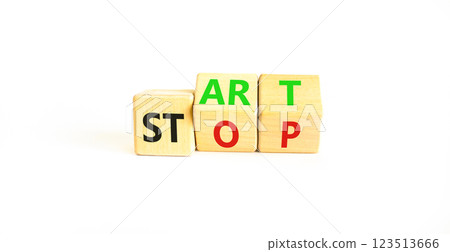 Start or stop symbol. Concept words Start or Stop on beautiful wooden block. Beautiful white table white background. Business start or stop concept. Copy space. 123513666