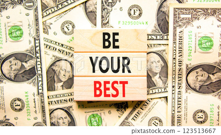 Motivational be your best symbol. Concept words Be your best on beautiful wooden blocks. Dollar bills. Beautiful background from dollar bills. Business motivational be your best concept. Copy space. Motivational be your best symbol. Concept words Be your best on beautiful wooden blocks. Dollar bills. Beautiful background from dollar bills. Business motivational be your best concept. Copy space. 123513667