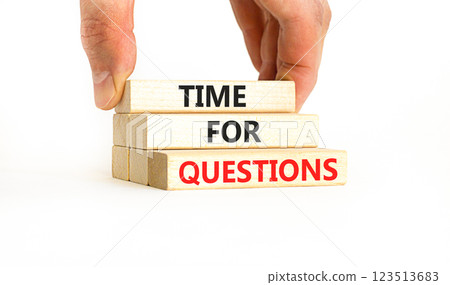 Time for questions symbol. Concept words Time for questions on beautiful wooden blocks. Beautiful white table white background. Businessman hand. Business time for questions concept. Copy space. 123513683