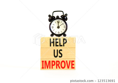 Help us improve symbol. Concept words Help us improve on beautiful wooden blocks. Beautiful white background. Black alarm clock. Business motivational help us improve concept. Copy space. 123513691