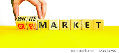 Grey or white market symbol. Concept words Grey market or White market on beautiful wooden blocks. Beautiful white background. Businessman hand. Business grey or white market concept. Copy space. 123513790