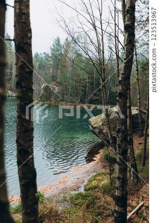 View of lake in Adrspach, Teplice Rocks in autumn. Autumn landscape with forest and lake. Travel concept. High quality photo. View of lake in Adrspach, Teplice Rocks in autumn. Autumn landscape with forest and lake. Travel concept. High quality photo. 123513967