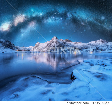 Milky Way arch, fjord and snowy mountains on starry winter night Milky Way arch, fjord and snowy mountains on starry winter night 123514644