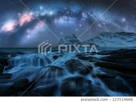 Night starry sky with Milky Way, snowy mountains, stones, sea 123514666
