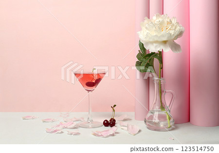 Modern still life with pink martini, summer alcoholic cocktail for party and peony flowers on elegant modern background, minimal concept for bar, cafe, advertising banner, selective focus, space for Modern still life with pink martini, summer alcoholic cocktail for party and peony flowers on elegant modern background, minimal concept for bar, cafe, advertising banner, selective focus, space for 123514750