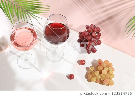 Modern still life with white and red wine, alcoholic margarita cocktail and grapes on pastel background with long hard shadows, minimal concept for bar, cafe, advertising banner, selective focus, Modern still life with white and red wine, alcoholic margarita cocktail and grapes on pastel background with long hard shadows, minimal concept for bar, cafe, advertising banner, selective focus, 123514756