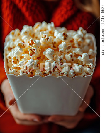 Popcorn snack food corn cinema buttery movie salty delicious crunchy container 123516625