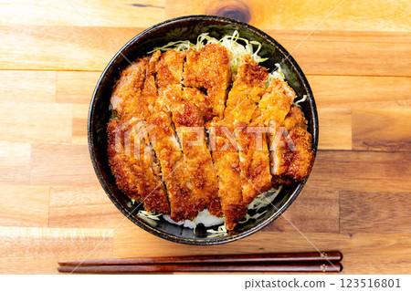 [Food ingredients] Sauce katsudon served in a bowl [Local cuisine] 123516801