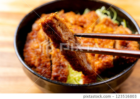 [Food ingredients] Sauce katsudon served in a bowl [Local cuisine] 123516803