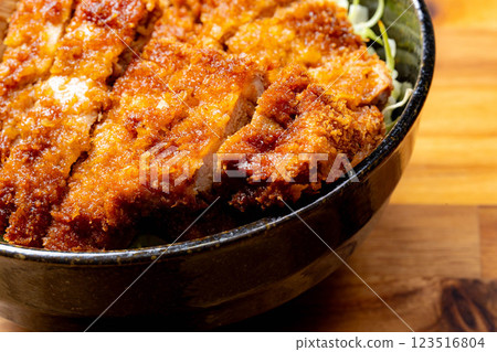 [Food ingredients] Sauce katsudon served in a bowl [Local cuisine] 123516804