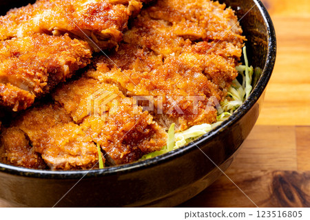 [Food ingredients] Sauce katsudon served in a bowl [Local cuisine] 123516805