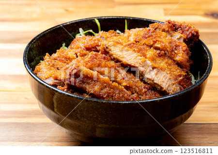 [Food ingredients] Sauce katsudon served in a bowl [Local cuisine] 123516811