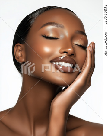 Beauty and elegance captured in a smile, showcasing a model's radiant face and smooth skin. 123516832