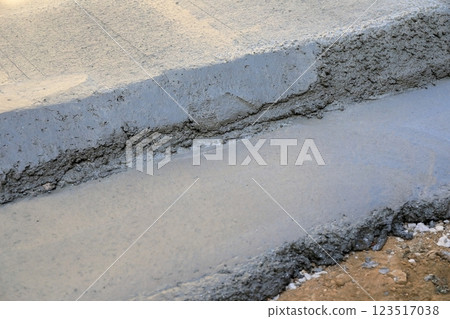 Residential foundation work: Waste concrete after pouring 123517038