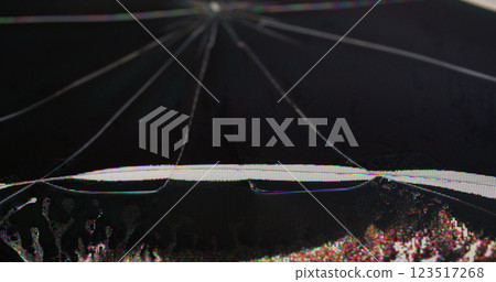 Crashed display. Failure artifacts. Black glass screen with damage pattern lines. Overlay glitch grunge grain surface defocused texture of modern electronic equipment. Crashed display. Failure artifacts. Black glass screen with damage pattern lines. Overlay glitch grunge grain surface defocused texture of modern electronic equipment. 123517268