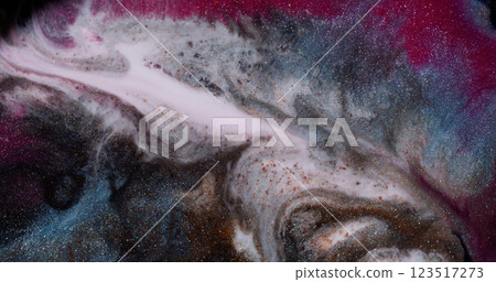 Art liquid. Sparkling paint. Wavy decorative marbling glitter particles surface. White grey gold chaotical mixing abstract background. 123517273