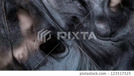 Shimmering emulsion. Paint drip. Messy ink gel acryl metal powder fluid smooth spilling mystic abstract black gray silver blur background. 123517325