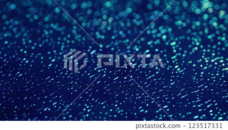Blurred relief. Artificial leather. Blue glisten wavy plastic surface with changing lighting. Decorative bright flare embossed background. 123517331