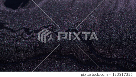 Shiny ash. Magic drip. Fantasy liquid flow sparkling volcanic dark purple sand ink wave abstract defocused wet hypnotic background. Shiny ash. Magic drip. Fantasy liquid flow sparkling volcanic dark purple sand ink wave abstract defocused wet hypnotic background. 123517335