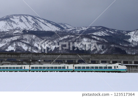 E653 series Kaminumatari color train running on the Echigo Tokimeki Railway with Mt. Myoko in the background in winter _ Express train "Shirayuki" _ Photographed on 2024/2/9 E653 series Kaminumatari color train running on the Echigo Tokimeki Railway with Mt. Myoko in the background in winter _ Express train "Shirayuki" _ Photographed on 2024/2/9 123517364