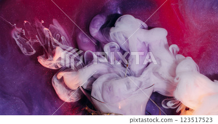 Fluid burst. Paint spreading. Pink violet white fume exploding on glittery abstract background. Veil liquid touching broken glass bulb. Fluid burst. Paint spreading. Pink violet white fume exploding on glittery abstract background. Veil liquid touching broken glass bulb. 123517523