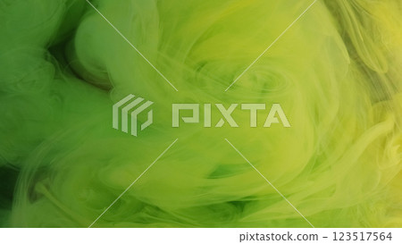 Multicolored fog. Green smoke. Elegant glowing veil curls of paint stir in water. Relaxing hypnotic atmosphere blur swirling abstract background. 123517564