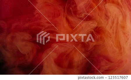 Ethereal fog texture. Atmospheric background. Defocused orange red color haze paint ink cloud vapor sparkle flow on abstract art. 123517607