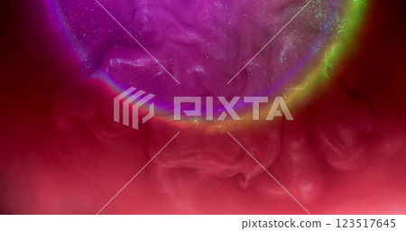 Shimmering dust. Smoke paint. Purple round arch gleam neon haze splash swirl mixing with red water. Sparkling liquid flow abstract background. 123517645