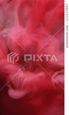 Mystical paint. Red haze. Foggy colored blur puff spray mist surface. Bright ink smoky dissolves in water mixing swirl abstract background. Mystical paint. Red haze. Foggy colored blur puff spray mist surface. Bright ink smoky dissolves in water mixing swirl abstract background. 123517647