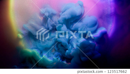 Ink vapor. Shimmering particles. Blue mist neon dye shot explosion on multicolor round sparkling liquid surface. Mystic mix water abstract background. 123517662