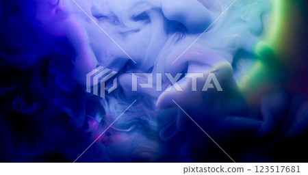 Mystical smoke. Shimmering liquid. Blue violet green paint fume artistic blending shade in round lens neon light background. Defocused abstract gleam texture. 123517681