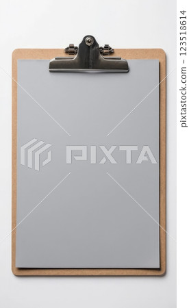 Tan clipboard with blank paper. Suitable for office, education, or presentation purposes. 123518614
