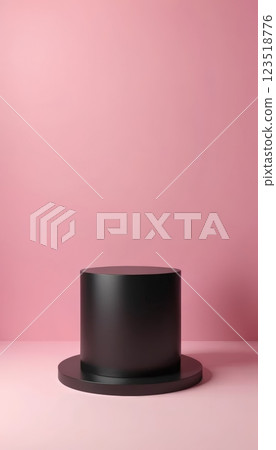 A clean display featuring a black cylindrical platform on a textured pink background, ideal for product displays, branding, or creative showcases in various contexts. 123518776